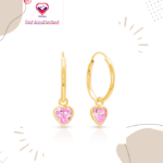 A classic pair of dainty hoops made with genuine 14K gold paired with a pretty CZ jeweled heart to add a little sparkle to her world.